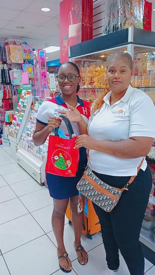 Summit rep with customer at Pennywise Trincity